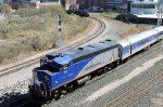 RNCX 105 leads train P075-08 away from RUS as CSX train L619 approaches